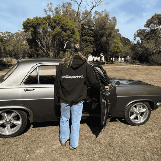 Black undiagnosed. hoodie by Burnt Clothing Co., product detail.