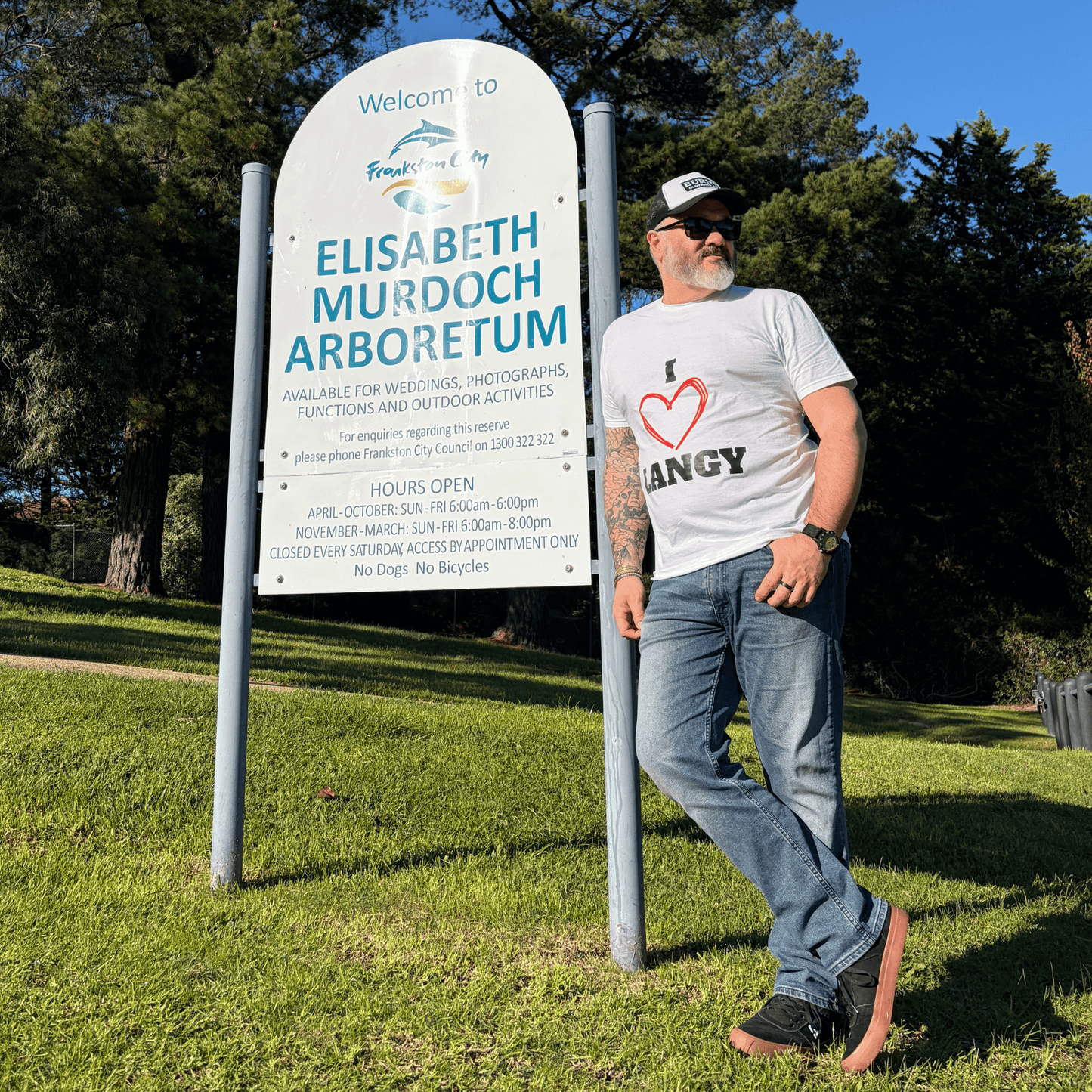 White I Love Langy tee worn near Elisabeth Murdoch Arboretum sign