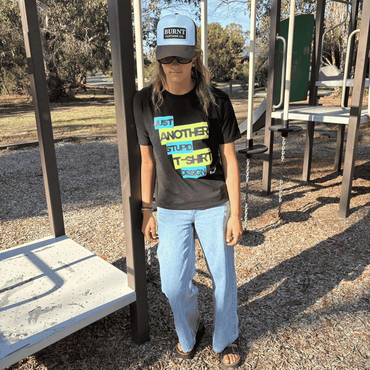 Model wearing Burnt JASTD graphic t-shirt