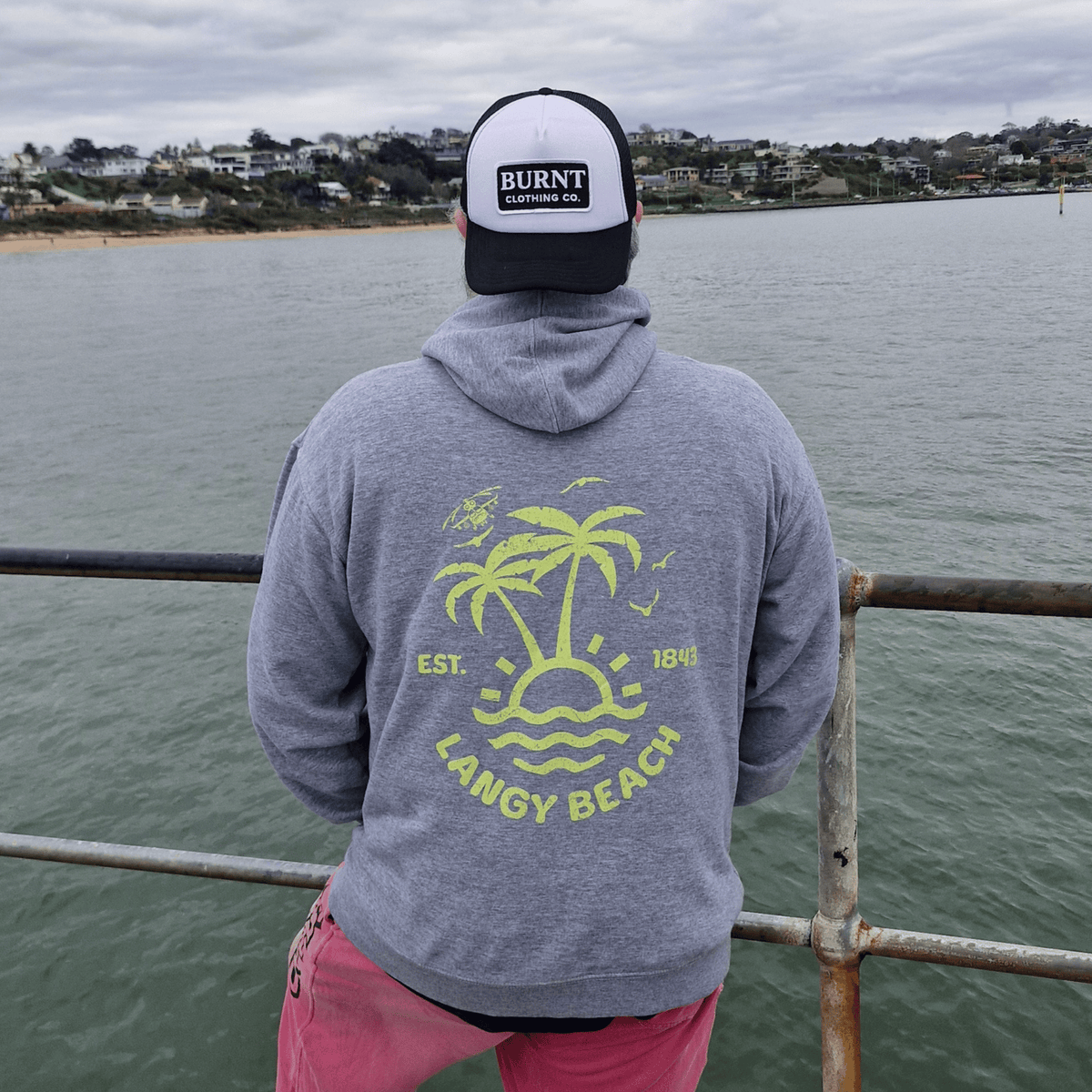 Model wearing Grey Langy Beach hoodie by Burnt Clothing Co