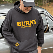 Lucky #17 black hoodie with raised orange puff print.