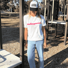 White undiagnosed. t-shirt with pink statement print by Burnt Clothing Co.