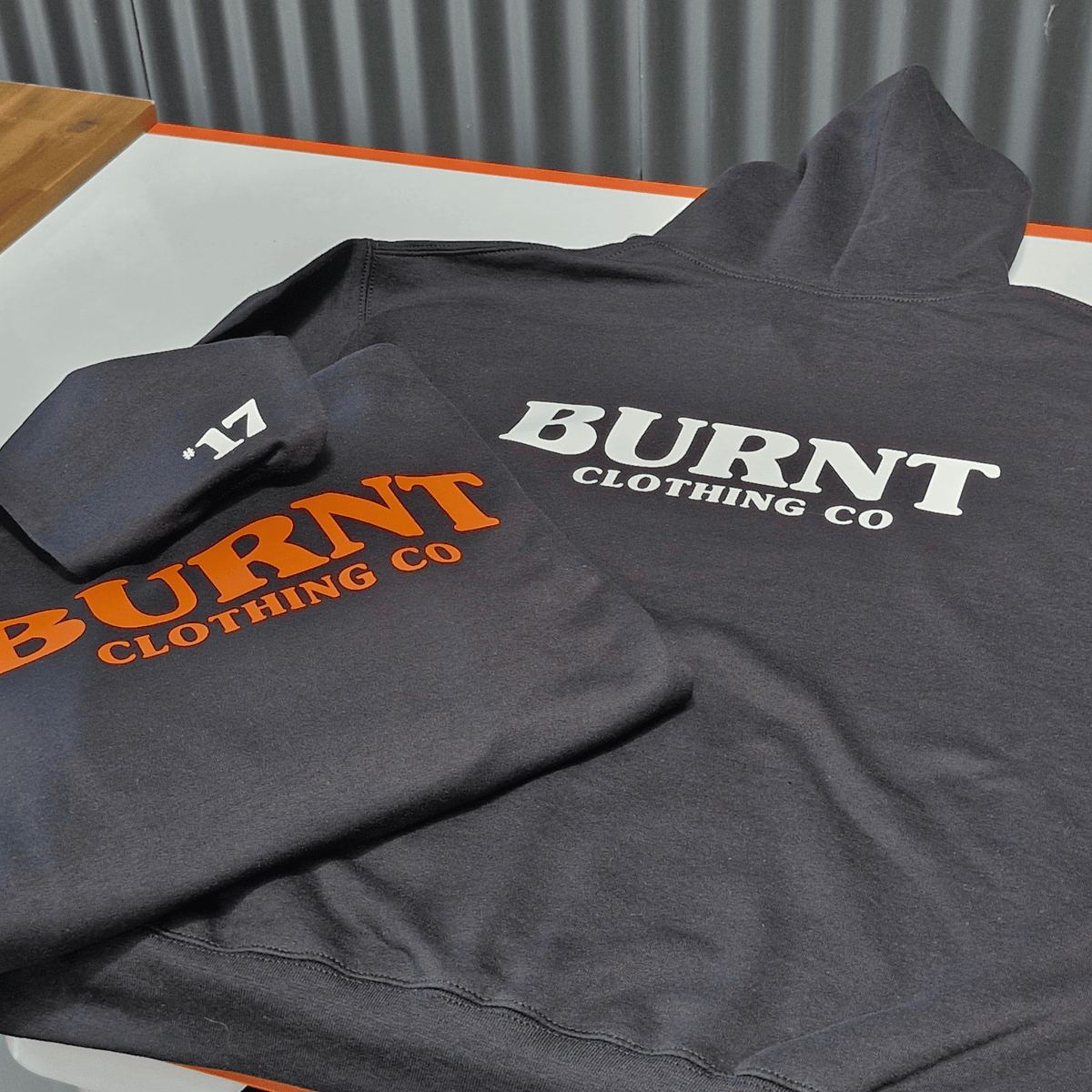 Lucky #17 black hoodie product view by Burnt Clothing Co.