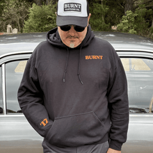 Lucky #17 Origin black hoodie with orange lettering.