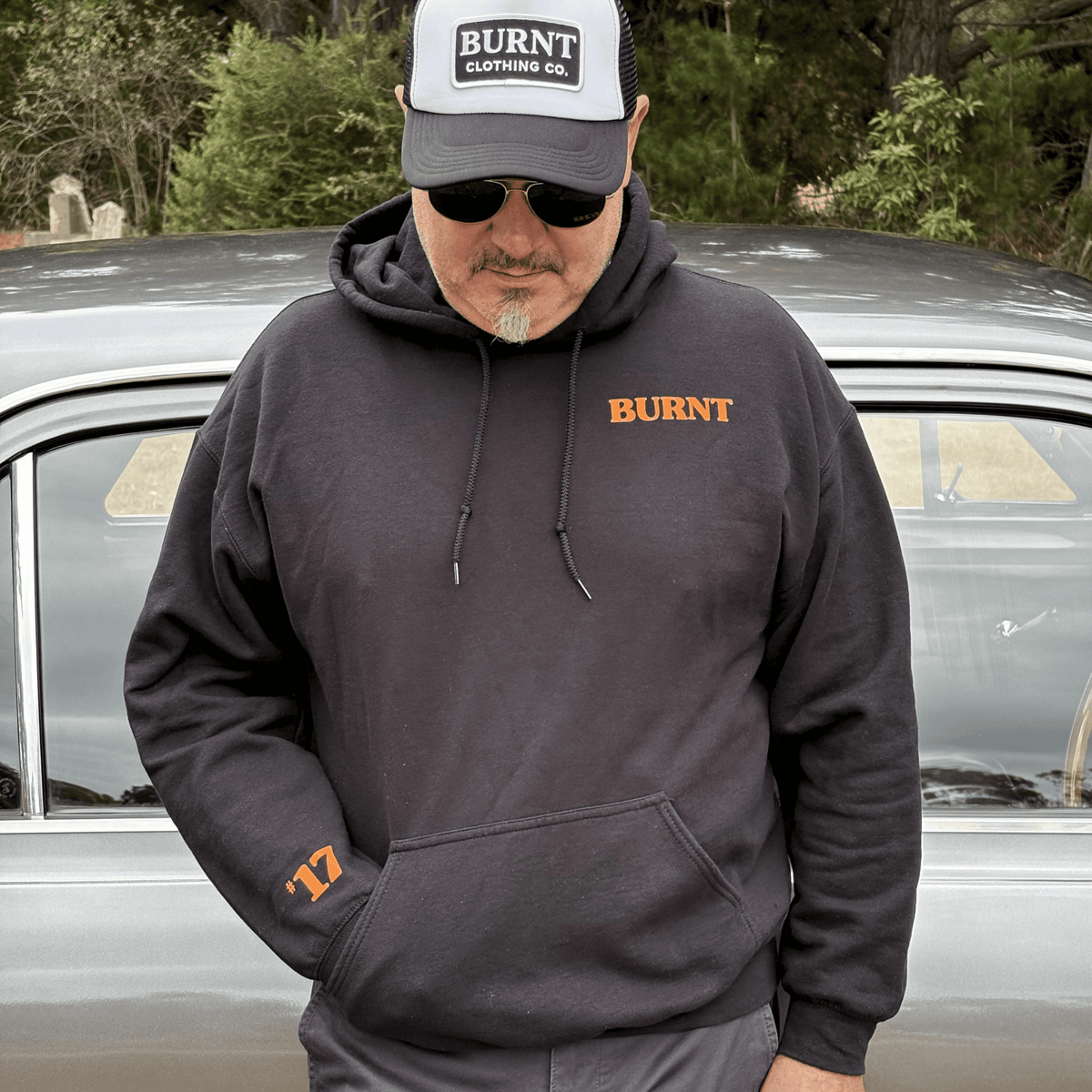 Lucky #17 Origin black hoodie with orange lettering.