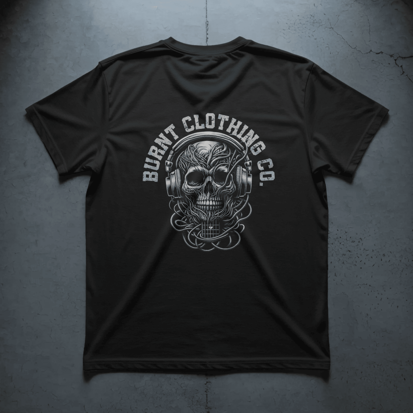 Burnt Clothing Co skull headphones graphic on black t-shirt