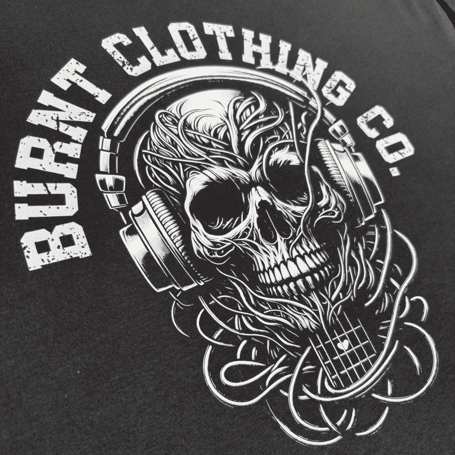 Burnt Clothing Co skull headphones graphic on black t-shirt