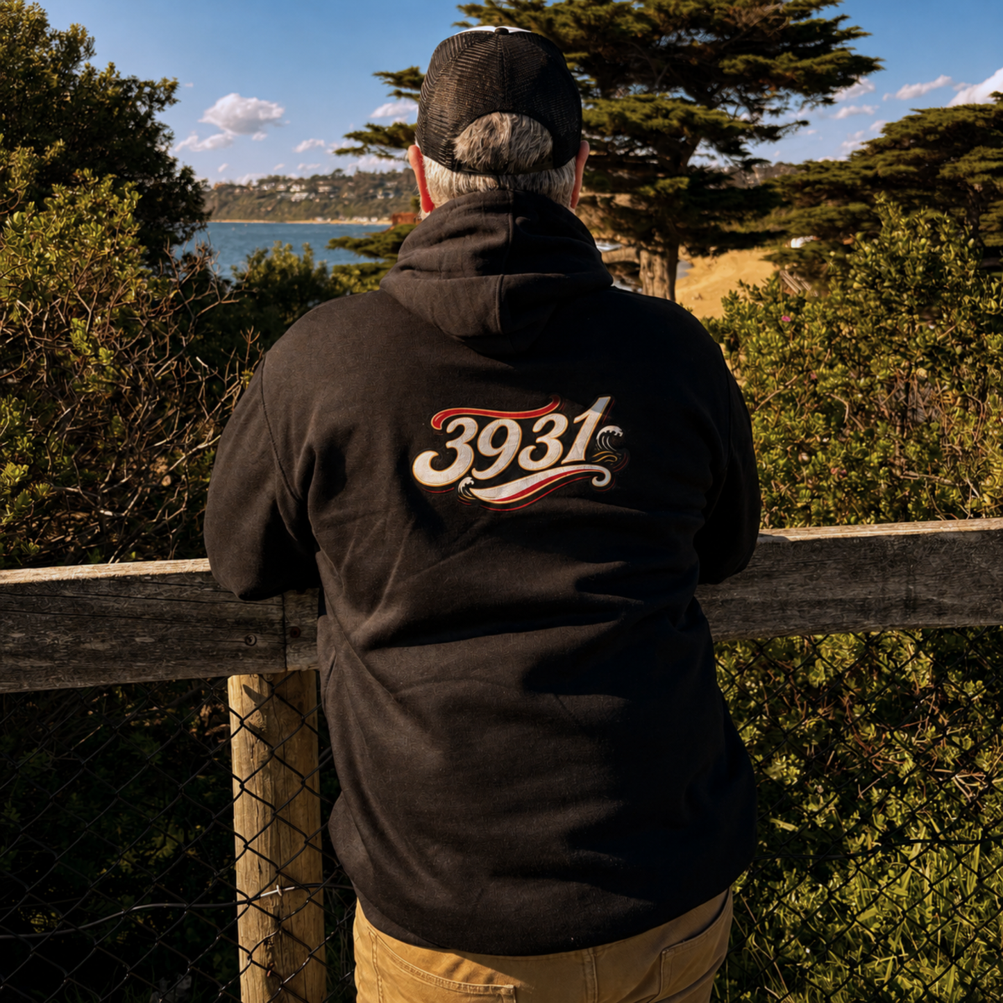 Back of The Ninch black hoodie displaying the customisable 3931 Mornington Peninsula postcode graphic