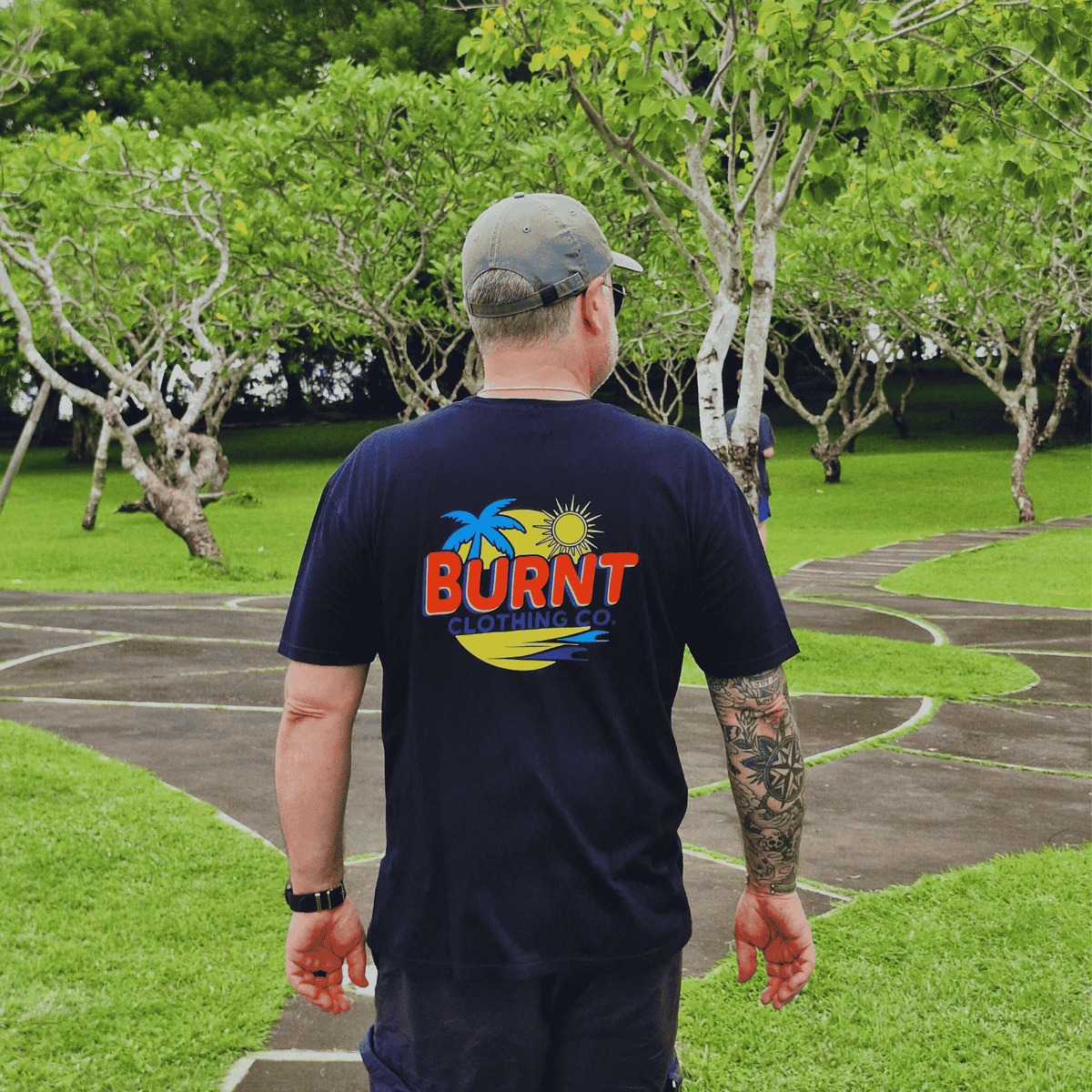 Model wearing The Original Burnt graphic T-shirt.