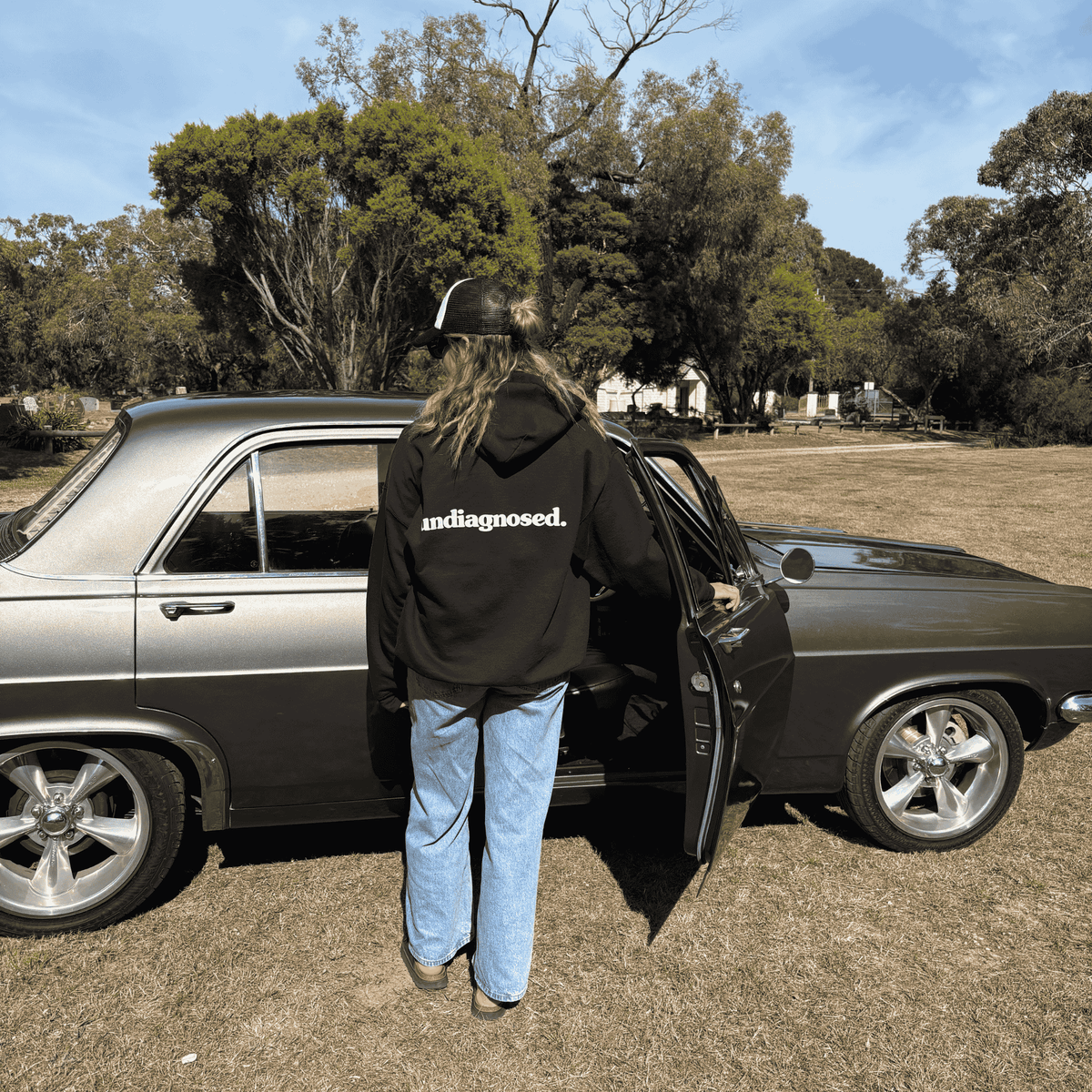 Black undiagnosed. hoodie by Burnt Clothing Co., product detail.